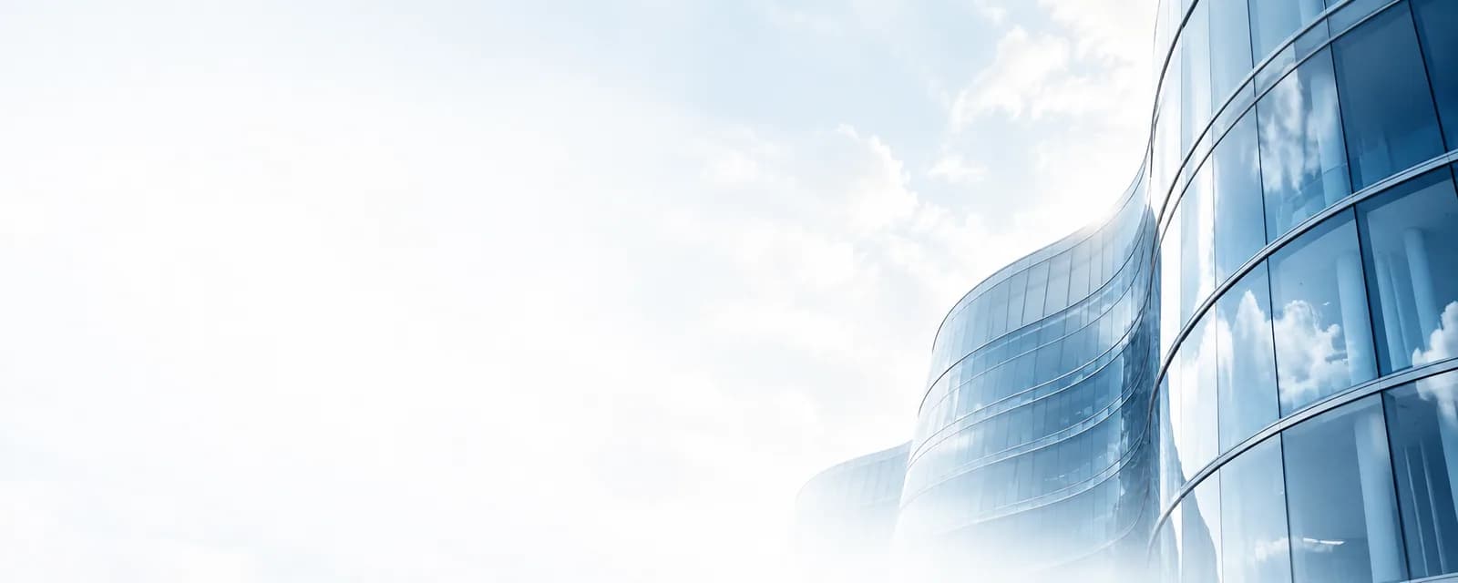 Curved glass facade of a contemporary building